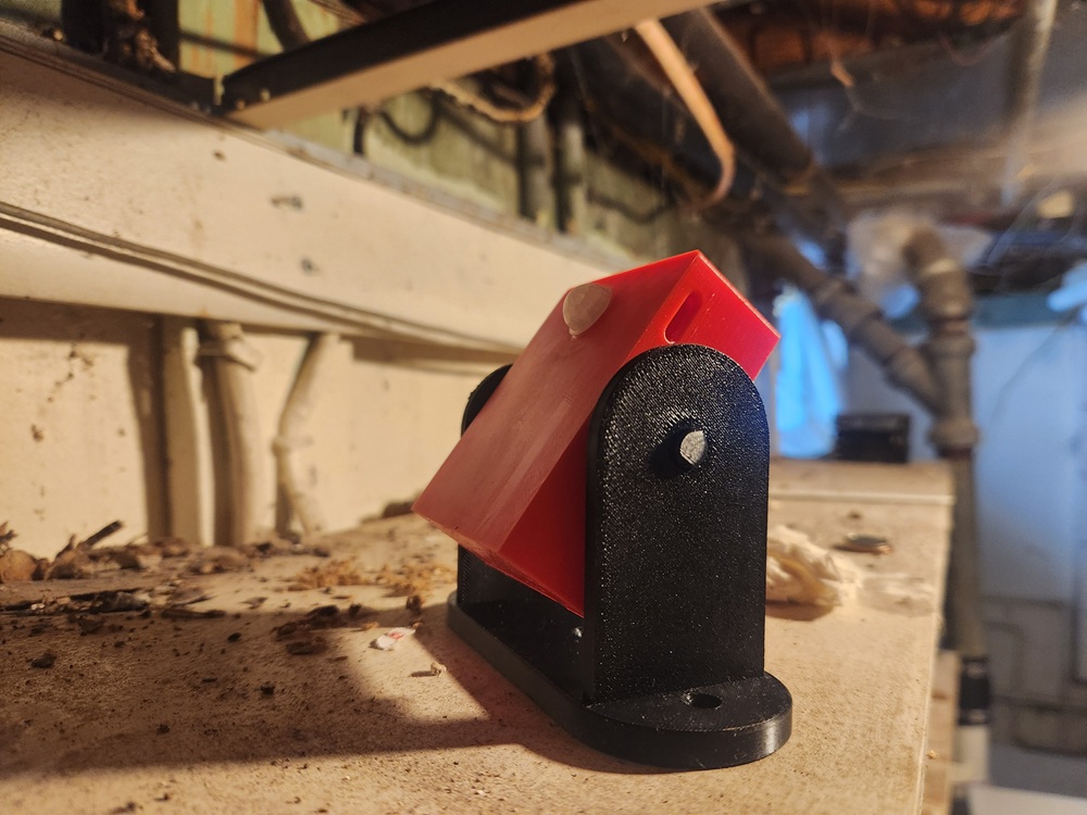 TiltMount with sensor angled upward toward pipes and joists